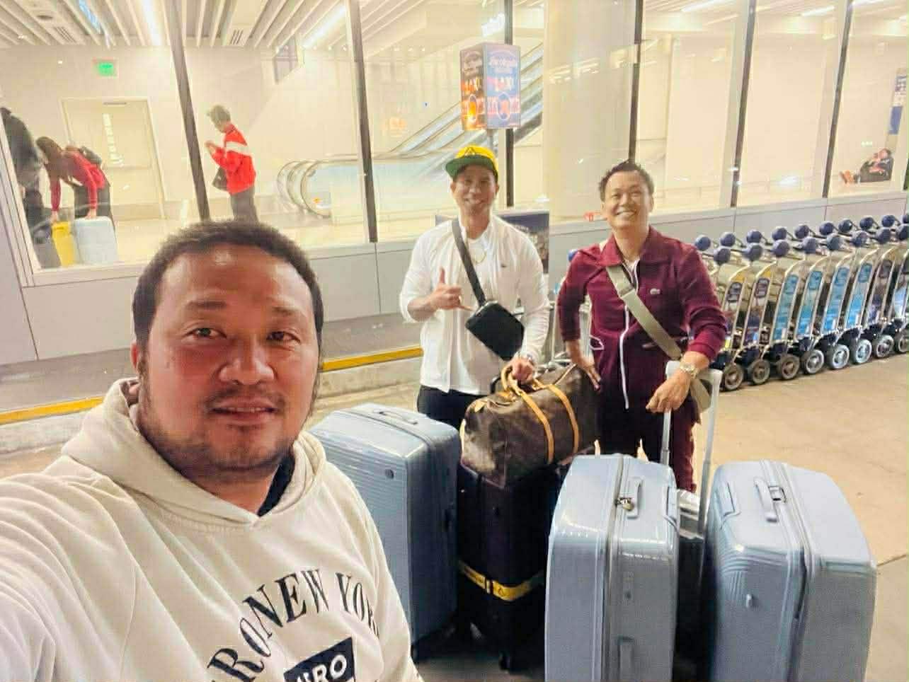 LAX arrival — Carts full, smiles wider